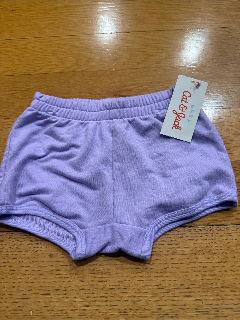 NWT Baby Cat& Jack purple short size 12 months.
